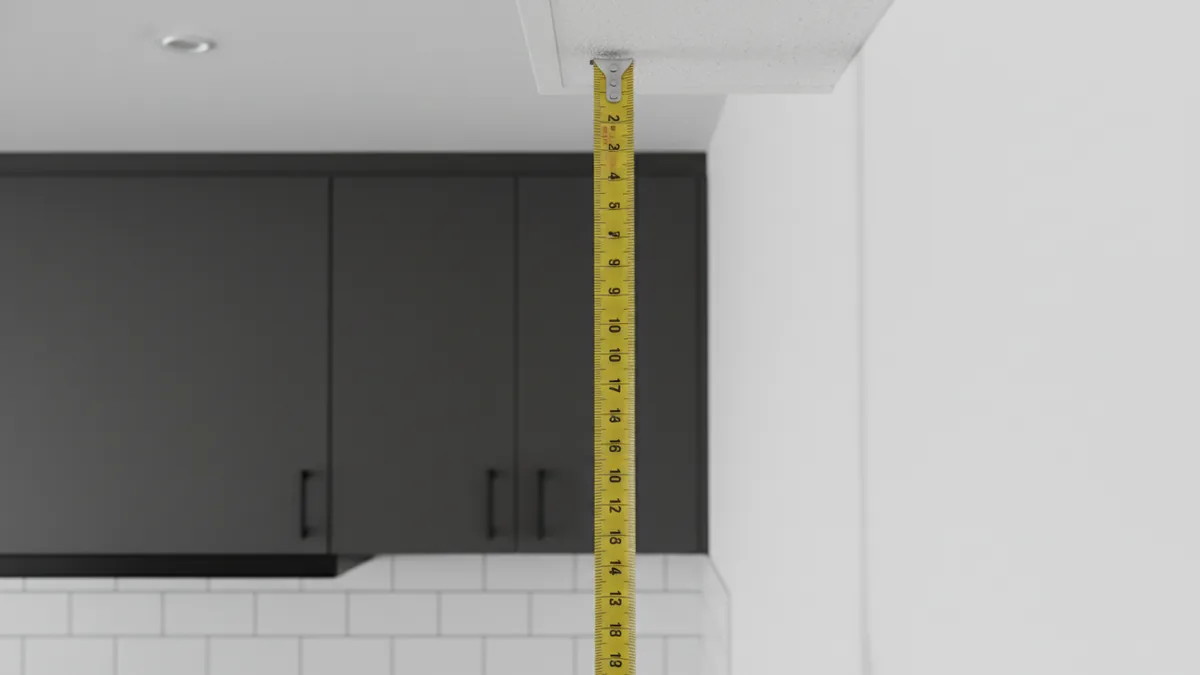 Measuring the gap above kitchen cabinets to plan decor height
