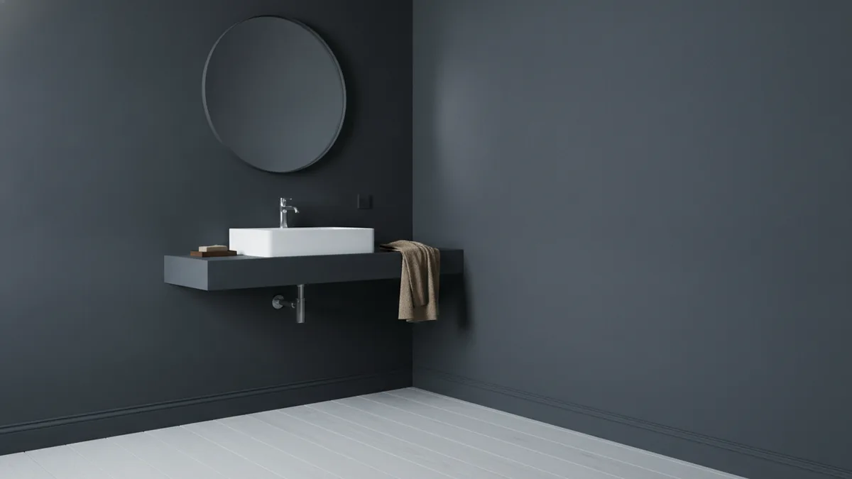 Light monochromatic color palette in a small bathroom with subtle contrast accents.
